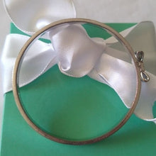Load image into Gallery viewer, Kate Spade New York Take A Bow Bangle Bracelet, Silver, 2 3/8" opening