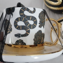 Load image into Gallery viewer, Halloween Elegance Black + Gold Serpents + Roses Coffee Tea Cups + Sauce with Lg. Canister
