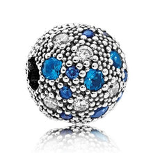 Load image into Gallery viewer, Pandora Retired Sterling Silver Cosmic Stars Clip with Blue Zirconia - 791286NSB