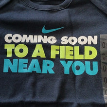 Load image into Gallery viewer, Nike Baby "Coming to A Field Near You" One piece in Obsidian Blue, 0-3m