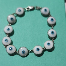 Load image into Gallery viewer, Blue and White Evil Eye Glass & Silver Bracelet