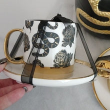 Load image into Gallery viewer, Halloween Elegance Black + Gold Serpents + Roses Coffee Tea Cups + Sauce with Lg. Canister