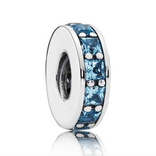 Load image into Gallery viewer, Pandora Retired Sterling Silver Eternity Spacer w/ Sky-Blue Crystal -791724NBS