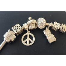 Load image into Gallery viewer, Chamilia Sterling Silver Bracelet 7.5" with 8 Decorative Charms