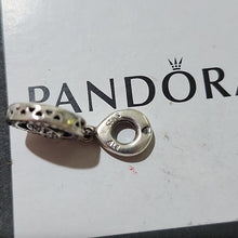 Load image into Gallery viewer, Pandora Sterling Silver Spinning Pandora Signature Dangle Charm - 797430cz