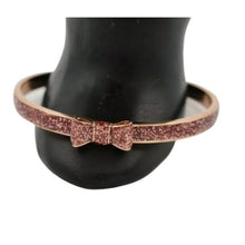 Load image into Gallery viewer, Kate Spade Take a Bow Enameled Bracelet in Rose Gold and Sparkling Pink