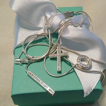 Load image into Gallery viewer, Sterling Silver Contemporary Y Necklace with CZs accenting Bar, Cross, + Open O