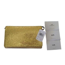 Load image into Gallery viewer, Coach x Wizard of Oz Gold Glitter Foldover Clutch
