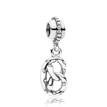 Load image into Gallery viewer, Pandora Retired Sterling Silver Pretzel Food Dangle Bead - 791218
