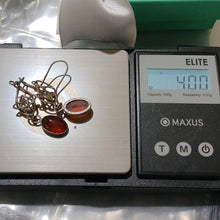 Load image into Gallery viewer, Sterling Silver + Amber Celtic Knot Dangle Earrings, Artisan Made
