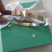 Load image into Gallery viewer, Kate Spade New York Take A Bow Bangle Bracelet, Silver, 2.5"
