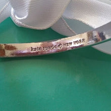 Load image into Gallery viewer, Kate Spade New York Take A Bow Bangle Bracelet, Silver, 2.5"
