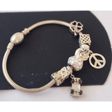 Load image into Gallery viewer, Chamilia Sterling Silver Bracelet 7.5" with 8 Decorative Charms
