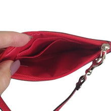 Load image into Gallery viewer, Coach Studded Liquid Gloss Small Wristlet
