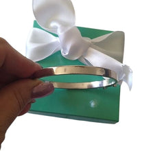 Load image into Gallery viewer, Kate Spade New York Take A Bow Bangle Bracelet, Silver, 2 3/8" opening
