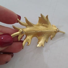 Load image into Gallery viewer, Vintage BSK Goldstone Metal Leaf Brooch
